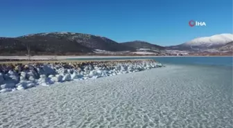 Son dakika haber! Eğirdir Gölü'nde eksi 17 derecede buzları kırıp dalış yaptılar