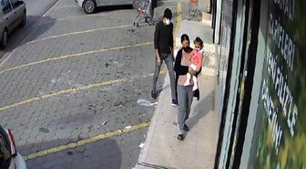 Kucağında bebeğiyle markete giren kadının cüzdanını çaldı