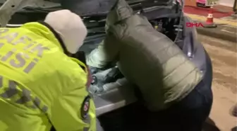 Kamyonetin motoruna giren kedi kurtarıldı