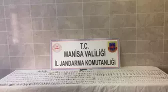 Manisa'da tarihi eser olduğu değerlendirilen 1100 sikke ve obje ele geçirildi