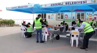 ERDEMLİ'DE KIRSALDAKİ ÖĞRENCİLERE ÜCRETSİZ BERBER VE KUAFÖR