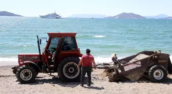 Fethiye'de caretta carettaların yumurta bıraktığı kumsal temizlendi