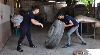 TIR lastiği ve jantla çalışarak güreşte derece yaptılar