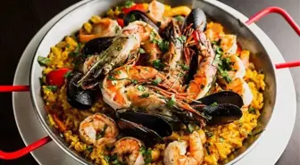 Paella tarifi! 23 Temmuz Masterchef Paella nasıl yapılır? Paella yemek tarifi! Paella için gerekli malzemeler nelerdir?