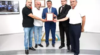Esnaf Oda Başkanlarından Gürkan'a plaket