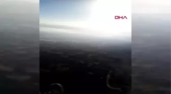 İŞE GEÇ KALMAMAK İÇİN FABRİKA BAHÇESİNE PARAŞÜTLE İNDİ; O ANLAR KAMERADA
