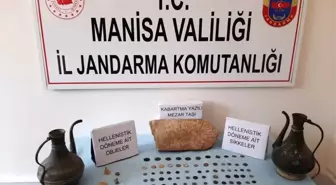 Manisa'da bir evde tarihi eserler ele geçirildi