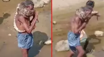Dere yatağında bulduğu yılanı boynuna dolayan sarhoş adam, yaptığına bin pişman oldu