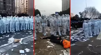 Sıkı korona tedbirleri iPhone işçilerini isyan ettirdi! Polisle çatışıp, 'Eve dönmek istiyoruz' sloganı attılar