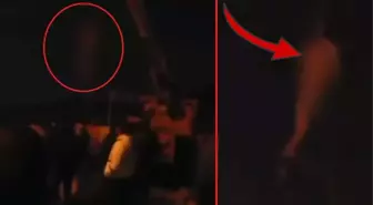 İran'da sokak ortasında idam! Vinçte sallanan protestocuyu film izler gibi izlediler