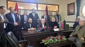 Ertuğrul Doğan, Divan Başkanı Ali Sürmen'i ziyaret etti