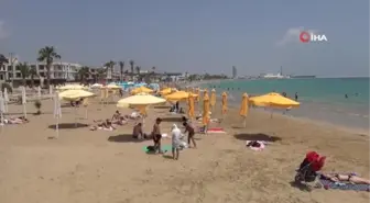 Mersinde oylarını kullananlar denize akın etti