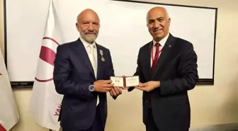 Dr. Suat İrfan Günsel'e 'TÜRKSOY 30. Yıl Altın Madalyası' takdim edildi