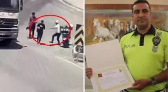 Genci ölümden kurtaran polis ödüllendirildi