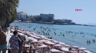 Kuşadası'nda Sıcak Hava Plajları Doldurdu