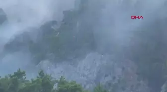 Kemer'de devam eden orman yangınına müdahale sürüyor