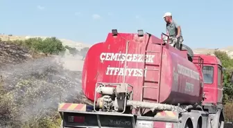 Tunceli'de kuru otlarla kaplı tarlada çıkan yangın söndürüldü