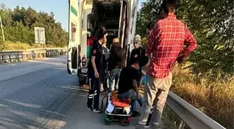 İnegöl'de şarampole düşen minibüs alev aldı: 2 yaralı