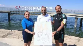 Ressam Çağdaş İlim, Van Gölü'ne dikkati çekmek amacıyla su altında resim çizdi