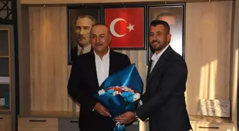 Mevlüt Çavuşoğlu Serik İlçe Başkanı Ahmet Söker'i ziyaret etti