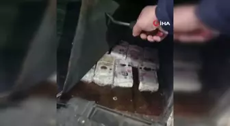Halat zincirler altına gizlenmiş 392 bin sterlin yakalandı