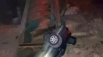 Çorum'un Uğurludağ ilçesinde otomobil sulama kanalına düştü, 2 kişi yaralandı