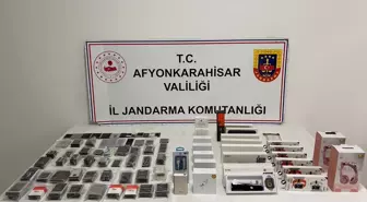 Afyonkarahisar'da kaçak elektronik ürün ele geçirilen sürücüye adli işlem uygulandı