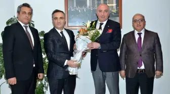 Erzurum Vergi Dairesi Başkanı Selahattin Atabek, Erzurum Ticaret ve Sanayi Odası'nı ziyaret etti