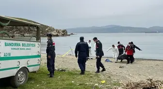 Bandırma'da kıyıya vuran erkek cesedinin kimliği belirlenmeye çalışılıyor