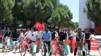 İKÇÜ Öğrencileri İsrail'in Gazze'ye Saldırılarını Protesto Etmek İçin Bisiklet Turu Attı