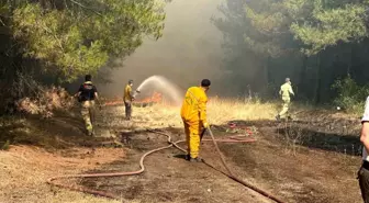 Yangına müdahale eden ekipler alevlerin içinde kaldı