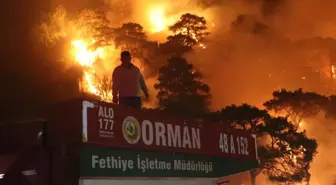 Dalaman'da orman yangını rüzgarın etkisiyle büyüdü, alevler iki mahalleye yaklaştı