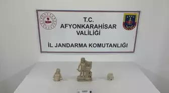 Afyonkarahisar'da Tarihi Eser Kaçakçılığı: Lir Tutan Apollon Heykeli Ele Geçirildi