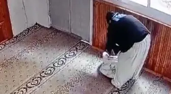 Camide kadın kılığında hırsızlık kamerada