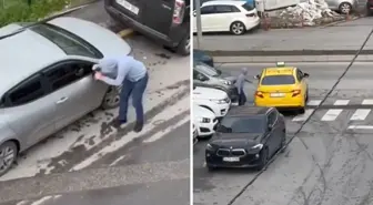 Park halindeki aracın aynasını kıran şahıs kamerada