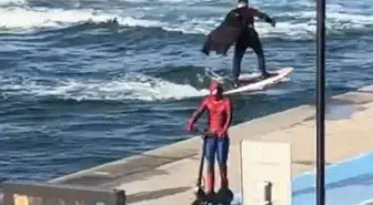 Bebek'te Batman sörf yaptı, Spider Man scooter kullandı