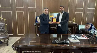 Diyarbakır Aile ve Sosyal Hizmetler Müdürü Aydın Polat'tan iş insanı Bozkuş'a ziyaret