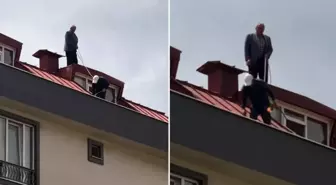 Çatı tadilatı yapan işçi beline ip bağlayarak güvenlik önlemi aldı