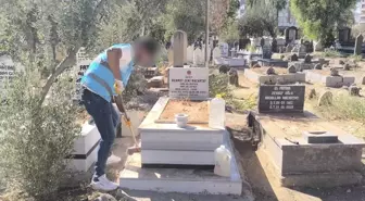 Cizre'de denetimli serbestlik yükümlüleri şehit kabirlerini temizledi
