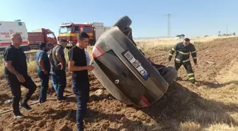Mardin'de Otomobilin Tarlaya Devrilmesi: Baba ve Kızı Yaralandı