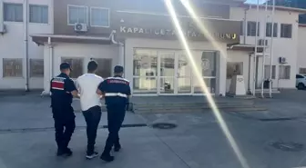 Kuşadası'nda 18 Yıl Hapis Cezası ile Aranan Şahıs Güneşlenirken Yakalandı
