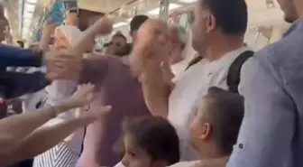 Marmaray'da iki küçük çocuğunun yanında darbedildi