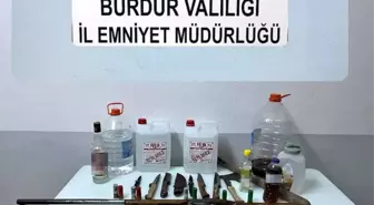 Burdur'da Kaçak İçki ve Silahlarla Dolu Evde Şüpheli Gözaltına Alındı