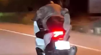 Motosiklet Üzerine Yatarak Seyreden Sürücüye 40 Bin TL Ceza