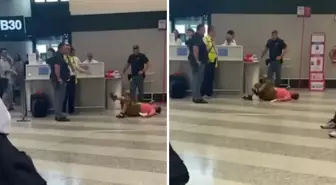 El bagajının fazla ağır olduğu söylenen kadın, sinir krizi geçirerek yerlere yattı