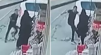 Sokak ortasında eşine tekme ve yumrukla saldırdı