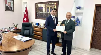 Hisarcık Kaymakamı Bahar'dan milli eğitim çalışanlarına başarı belgesi