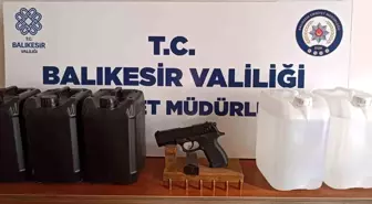 Bandırma'da Ruhsatsız Tabanca ve Etil Alkol Ele Geçirildi