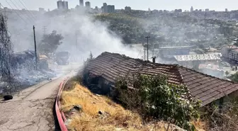 Ankara'da ağaçlık alanda çıkan yangın gecekondulara sıçradı