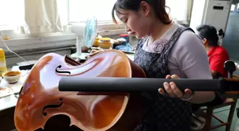 Çin'in Queshan İlçesi Keman Ailesi Endüstrisini Geliştiriyor